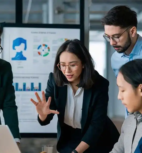 Team reviewing production analytics